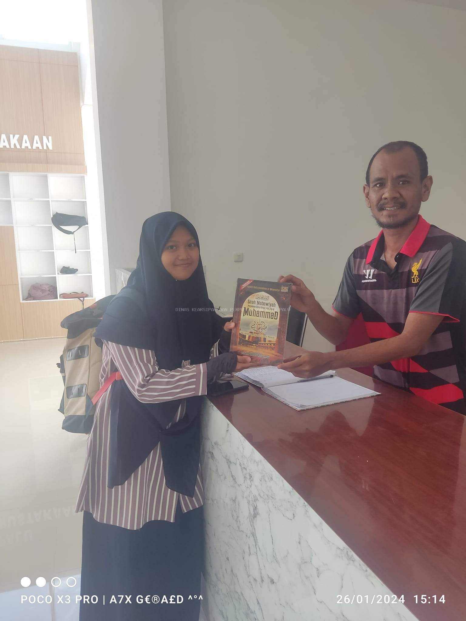 PENYERAHAN BUKU
