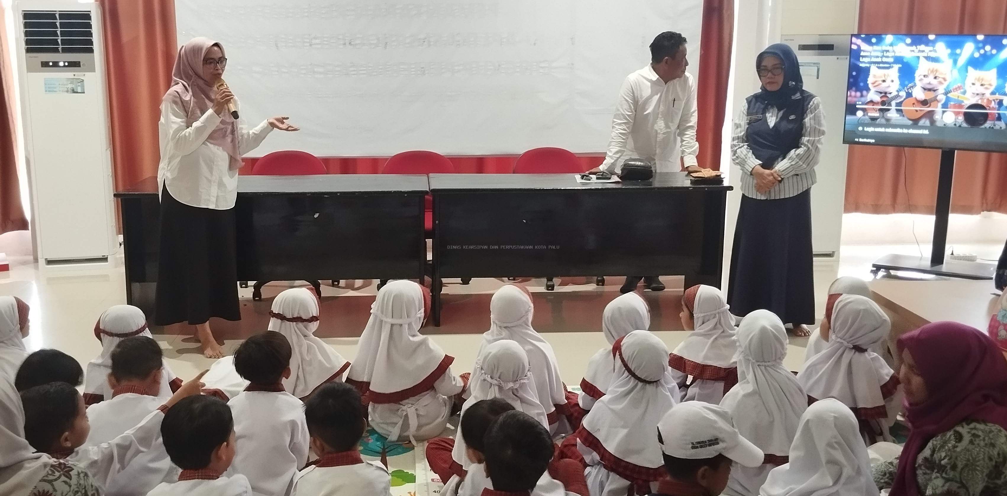 KUNJUNGAN LITERASI TK CENDEKIA TADULAKO KE DINAS KEARSIPAN DAN PERPUSTAKAAN KOTA PALU